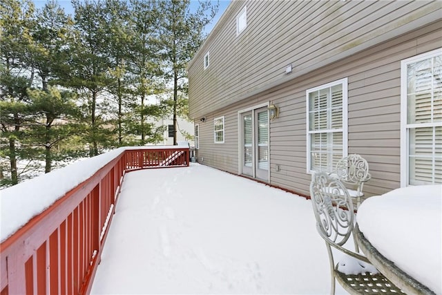 view of snow covered deck