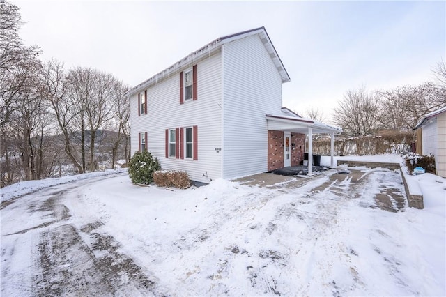 view of snow covered property