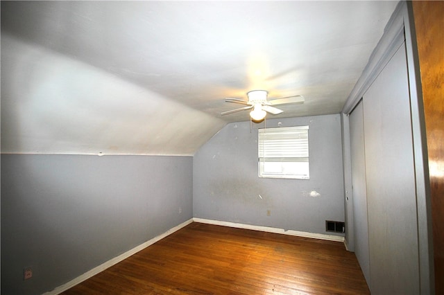 bonus room featuring vaulted ceiling, ceiling fan, and dark hardwood / wood-style floors