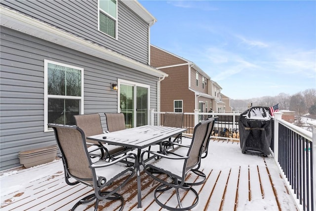 view of snow covered deck