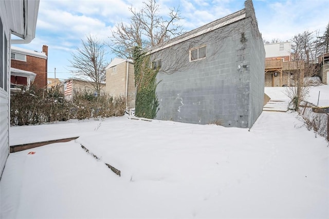 view of snow covered property