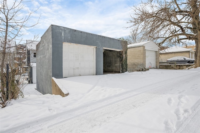 view of snow covered garage