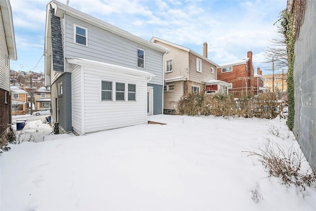 view of snow covered property