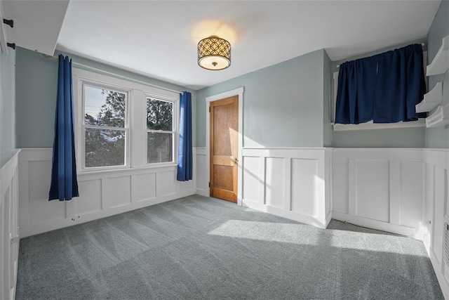 unfurnished bedroom featuring light colored carpet