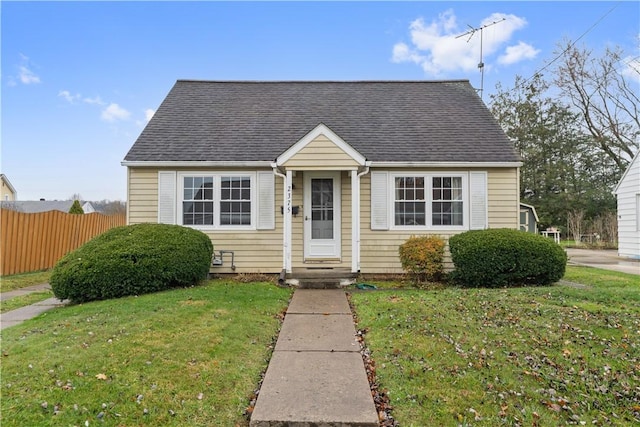 bungalow with a front lawn