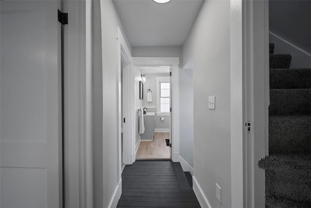 hall featuring dark wood-type flooring