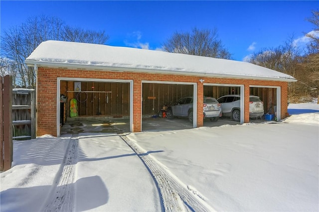 view of snow covered garage