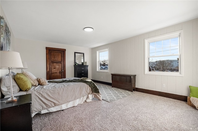 bedroom with light colored carpet