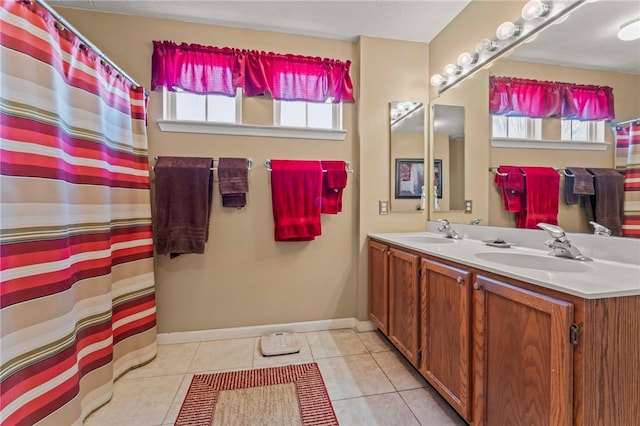 bathroom featuring tile patterned floors and vanity