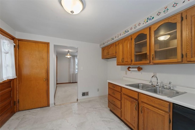 kitchen featuring sink and dishwasher