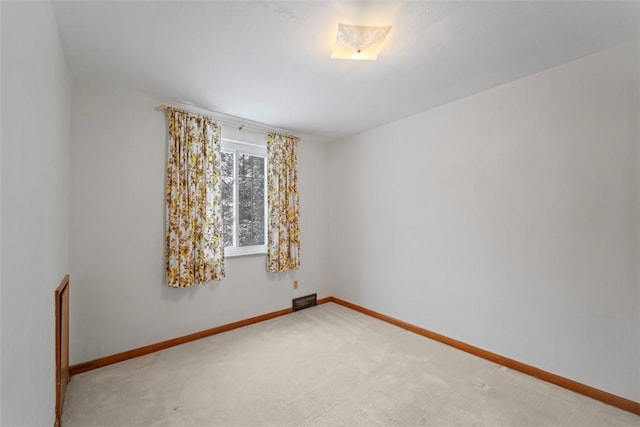 spare room with carpet flooring