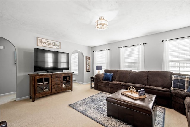 living room with light colored carpet