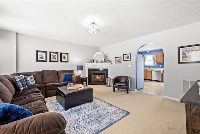 living room featuring light colored carpet