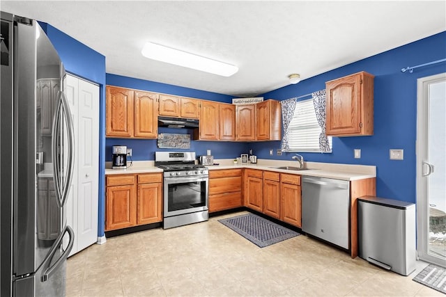 kitchen with sink and appliances with stainless steel finishes