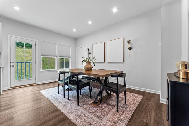 dining area featuring dark hardwood / wood-style flooring