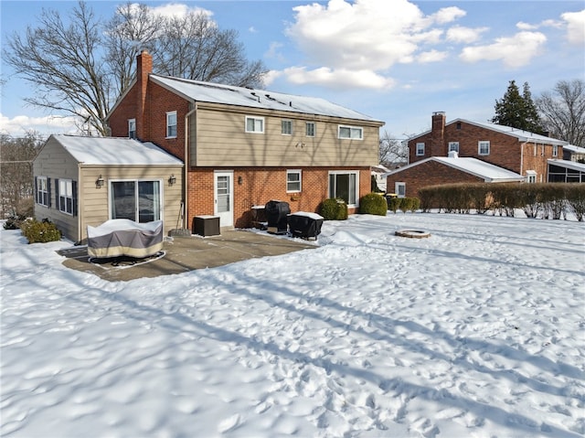 view of snow covered property