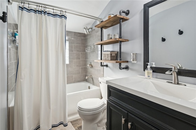 full bathroom featuring shower / bath combo, hardwood / wood-style floors, toilet, and vanity