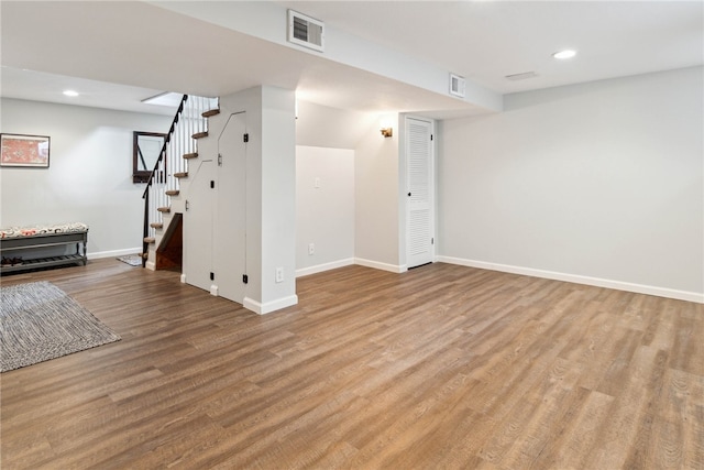 spare room featuring light hardwood / wood-style flooring