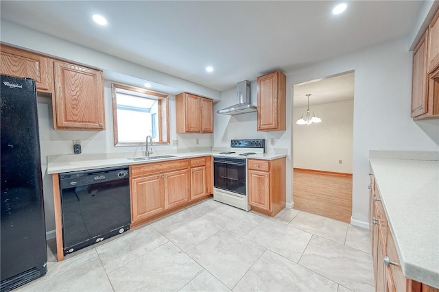 kitchen with black appliances, wall chimney range hood, sink, hanging light fixtures, and a chandelier