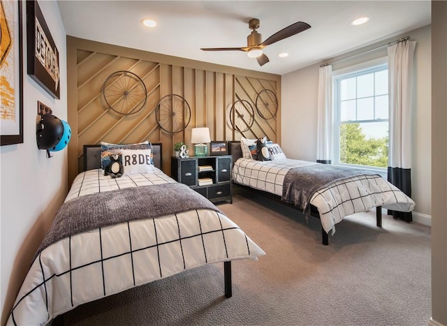 bedroom featuring ceiling fan and carpet flooring