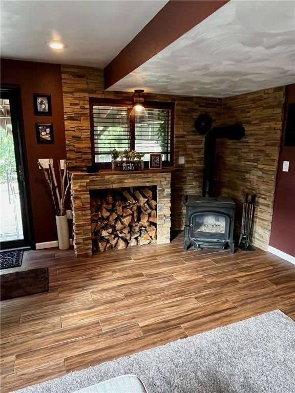 living room with a wood stove