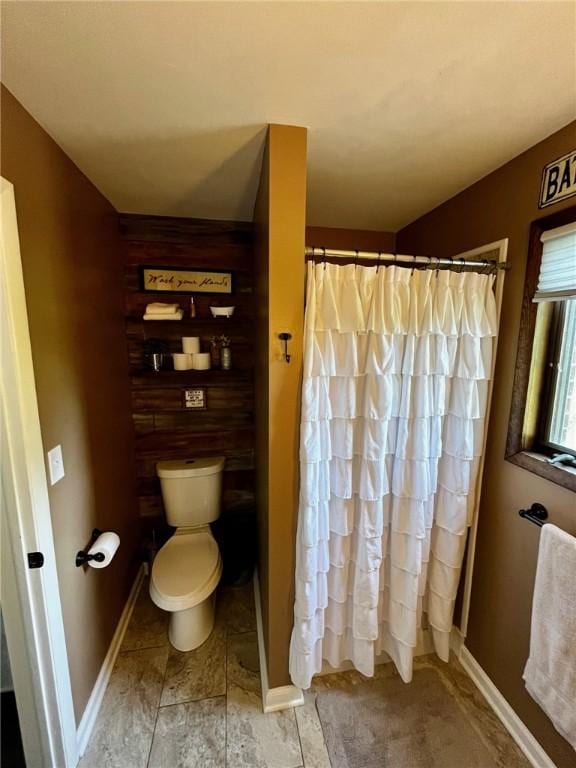 bathroom featuring toilet