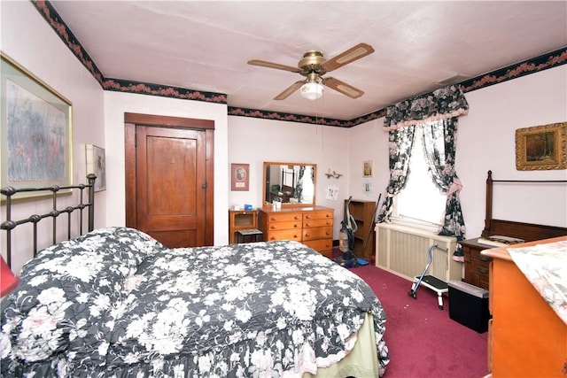 bedroom with radiator heating unit, carpet floors, and ceiling fan