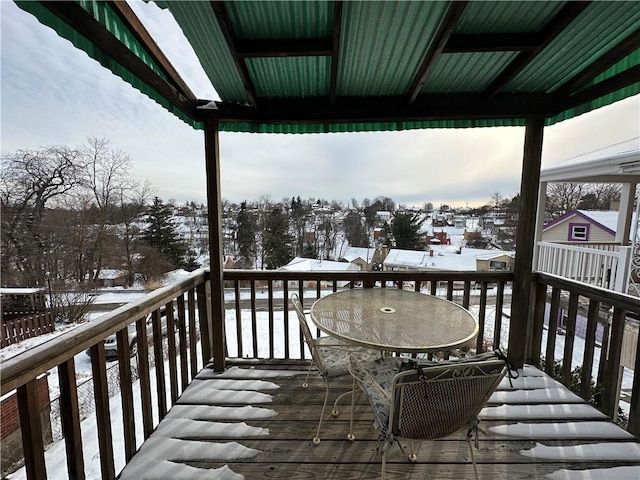 view of snow covered deck