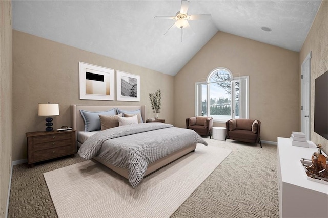 carpeted bedroom with ceiling fan and vaulted ceiling