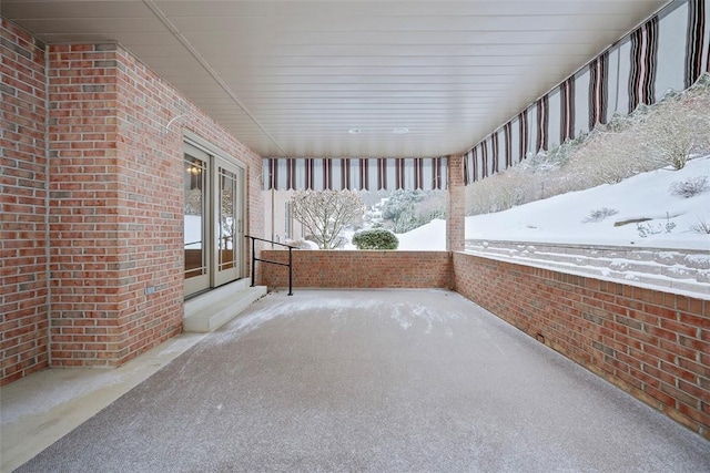 view of snow covered patio