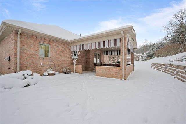 view of snow covered property