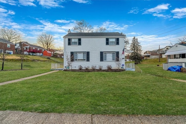 view of front of house with a front lawn