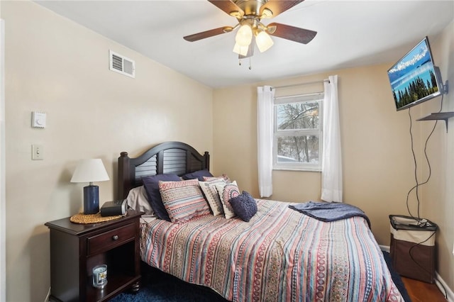 bedroom featuring ceiling fan and hardwood / wood-style flooring