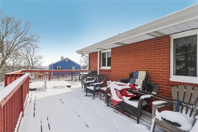 view of snow covered deck