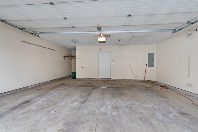 garage with electric panel and a garage door opener