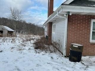 view of snow covered property