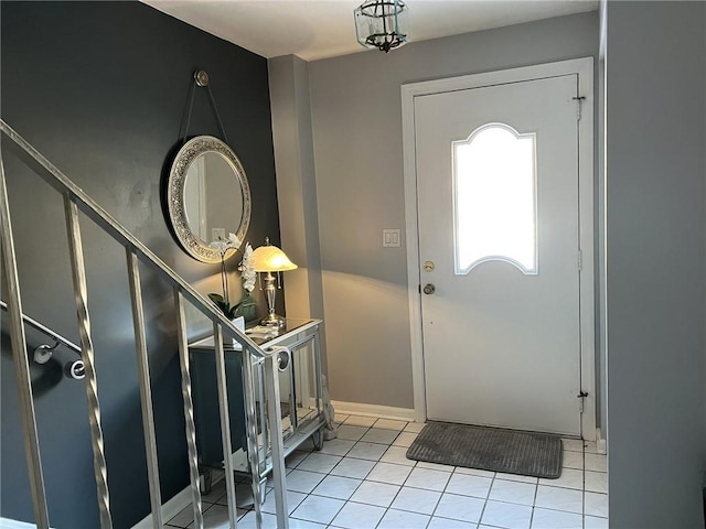 entryway with light tile patterned flooring