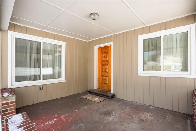 entrance to property featuring a patio area