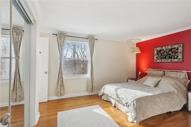 bedroom featuring wood-type flooring