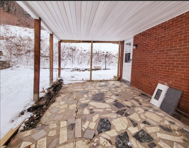 view of snow covered patio