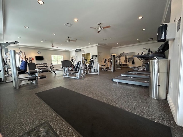 exercise room featuring crown molding and ceiling fan