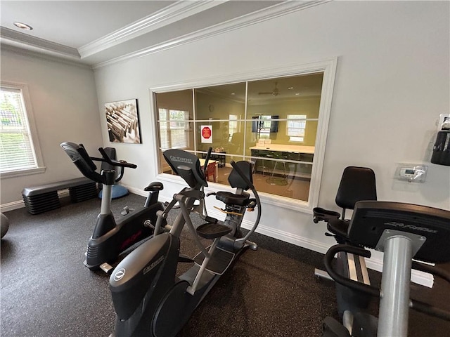 workout room with ornamental molding