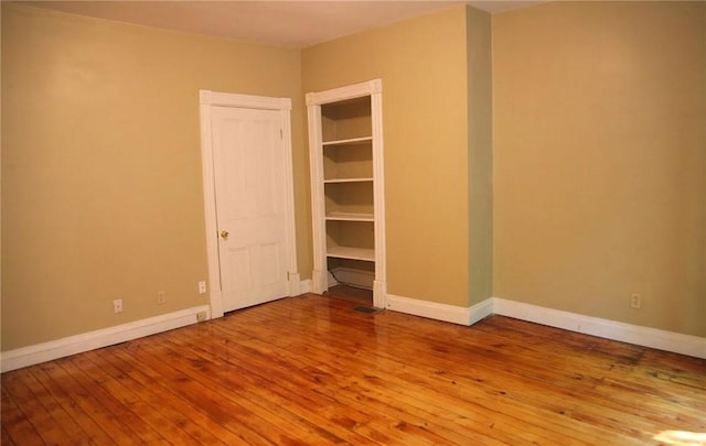 unfurnished bedroom with light hardwood / wood-style floors