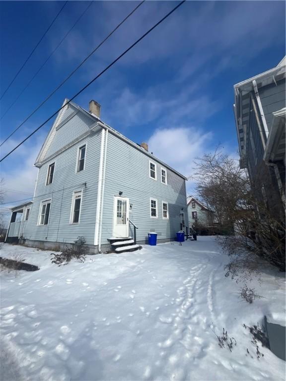 view of snow covered property