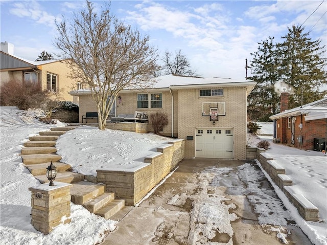 view of front of home with a garage