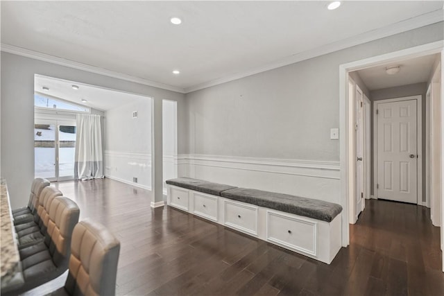 interior space with crown molding, lofted ceiling, and dark hardwood / wood-style flooring