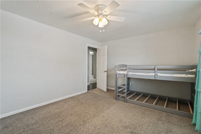 unfurnished bedroom featuring carpet and ceiling fan