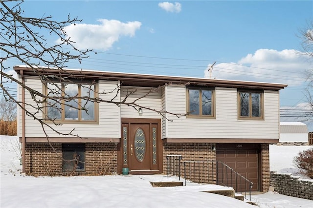 bi-level home featuring a garage