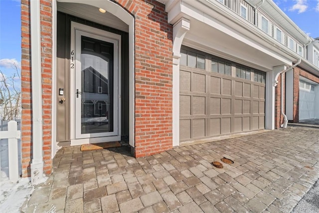 property entrance with a garage