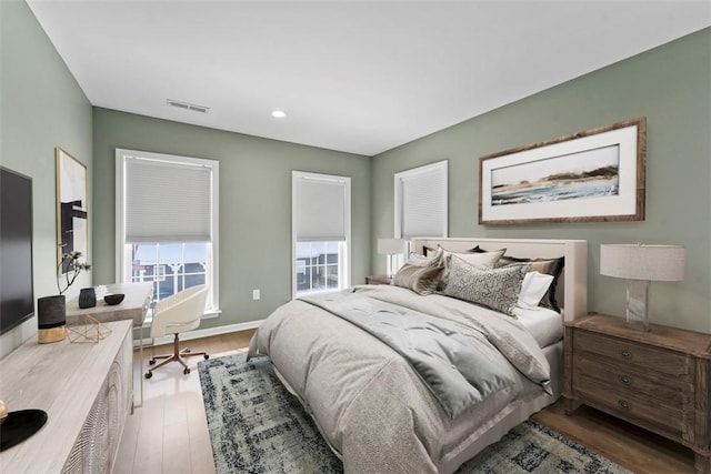 bedroom featuring hardwood / wood-style flooring